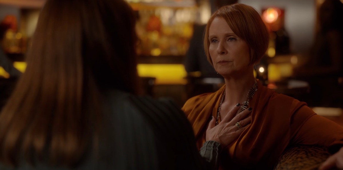 Joy puts her hand on Miranda's chest