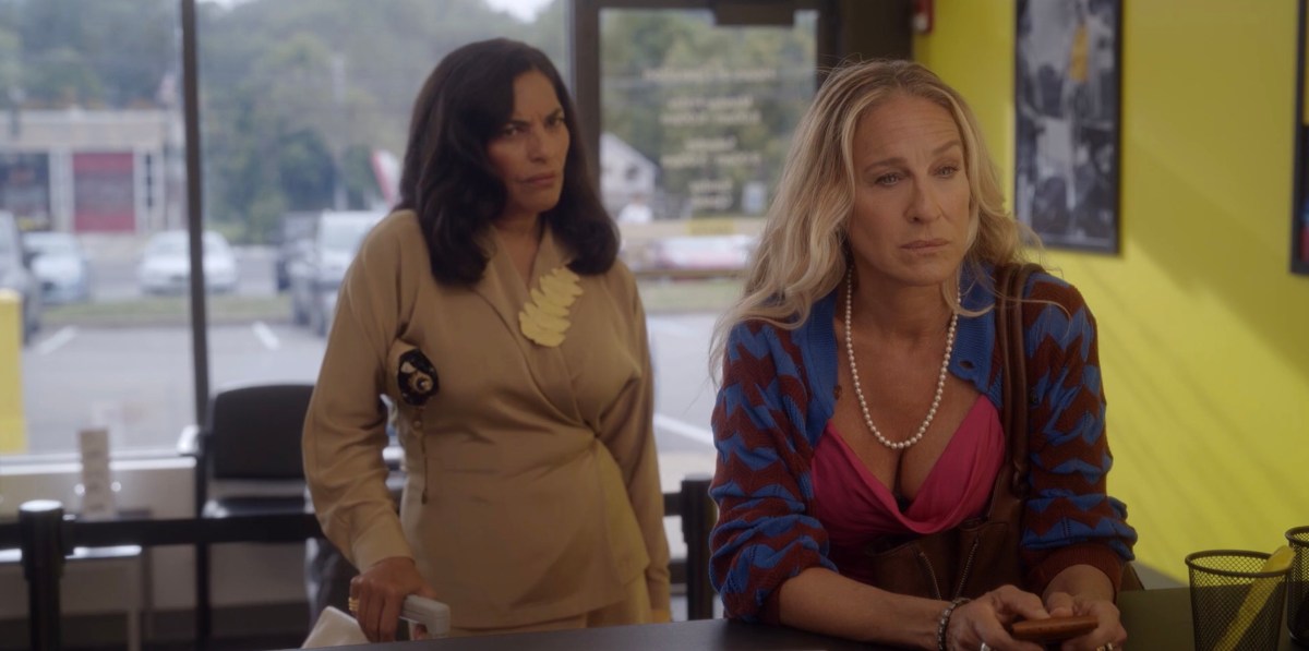 carrie and sima at the desk