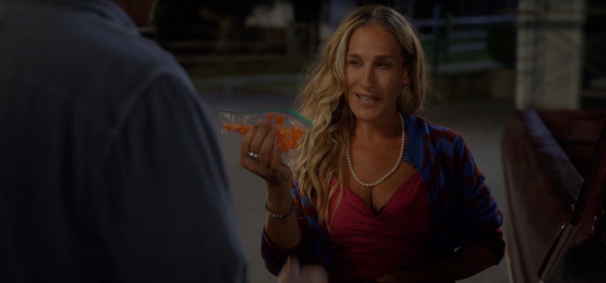 Carrie holding a bag of adderalls