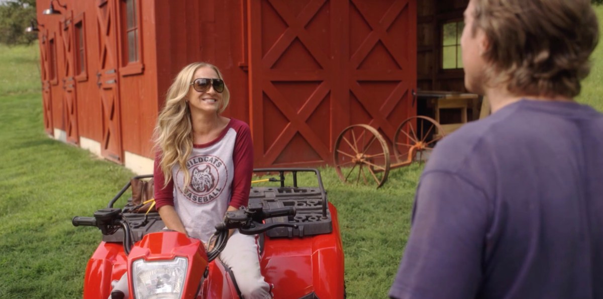 carrie sitting on an ATV