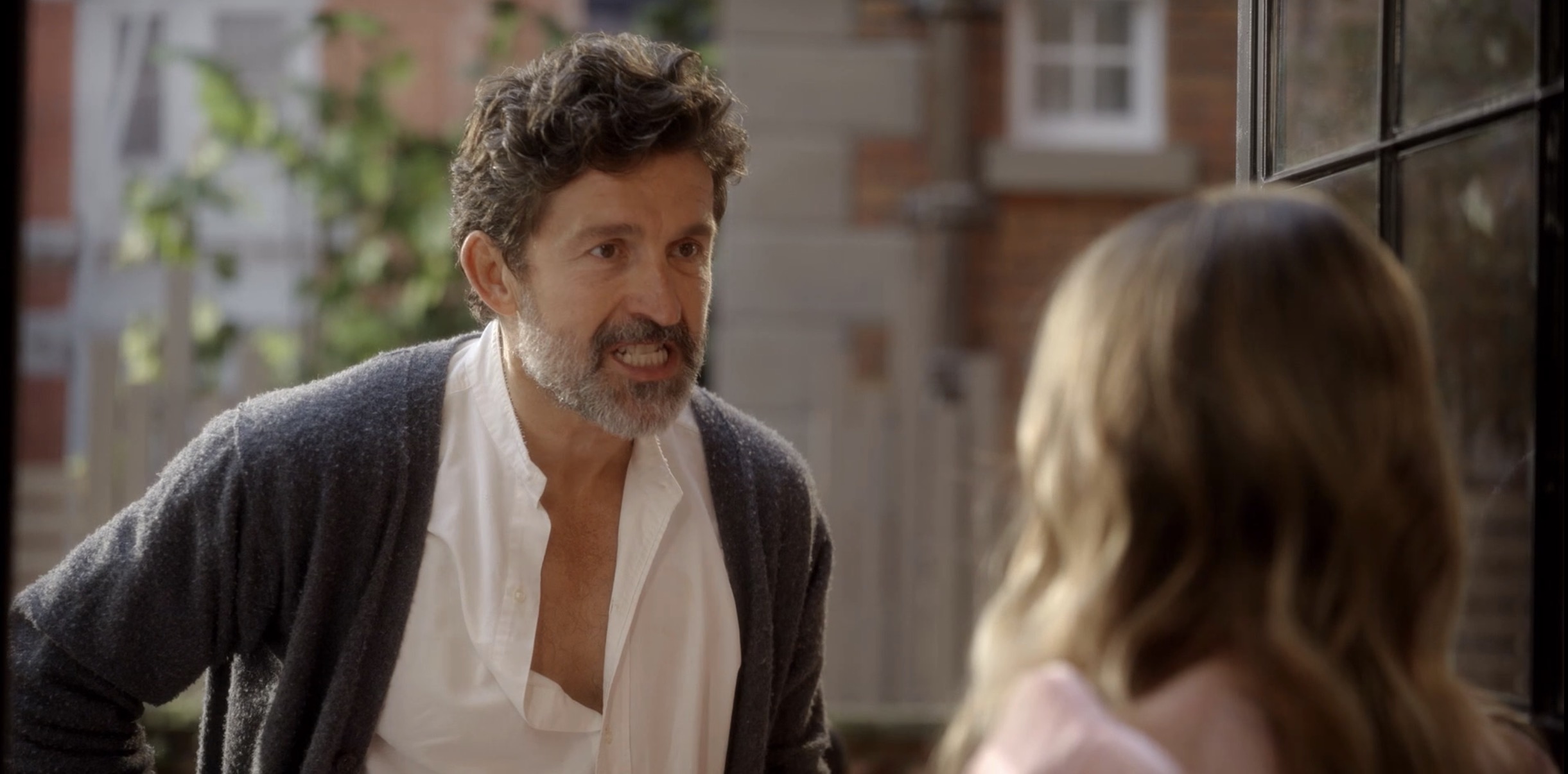 man yelling at carrie