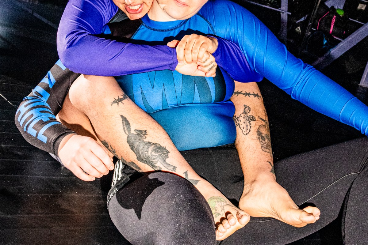 Mylo Mendez, upper left, and Irina Groushevaia, center, move around each other during the jiu-jitsu training.