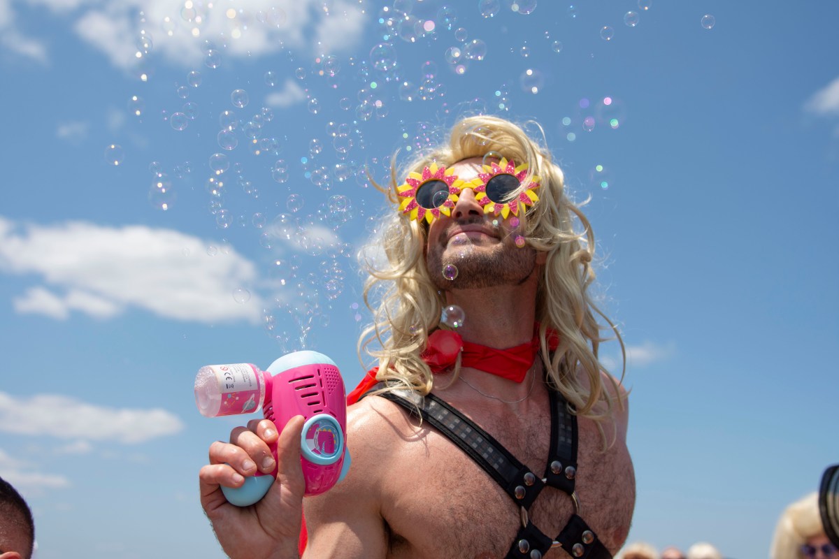 a person with a bubble gun