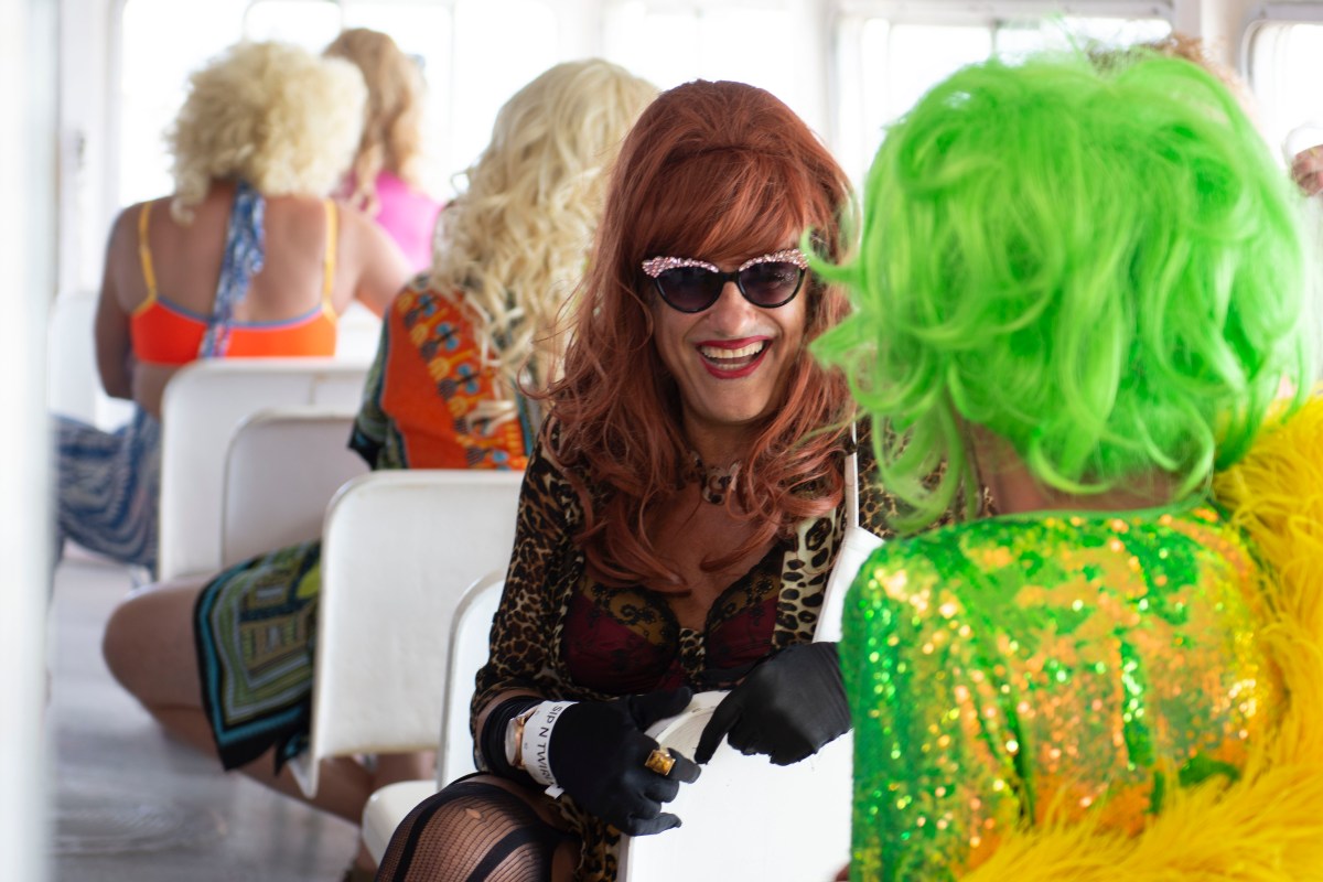 a group of drag queens onboard the ferry