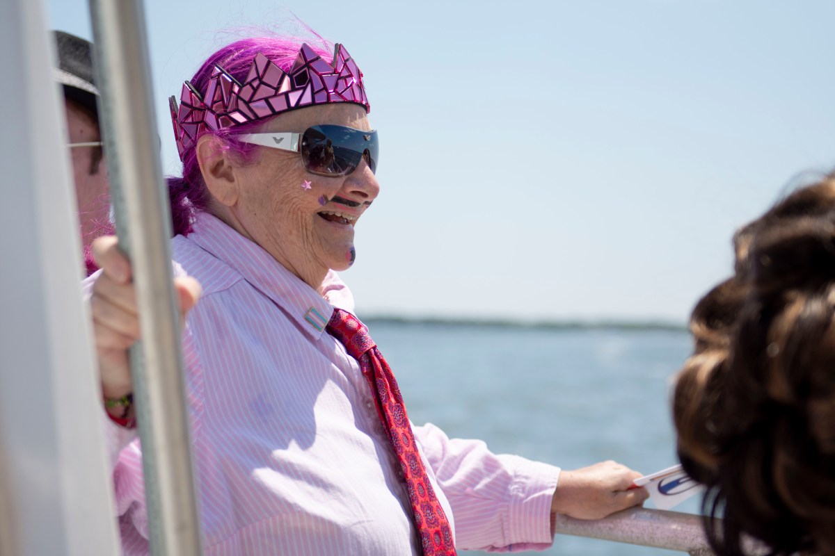 a drag king onboard the ferry for the 50th invasion of the pines