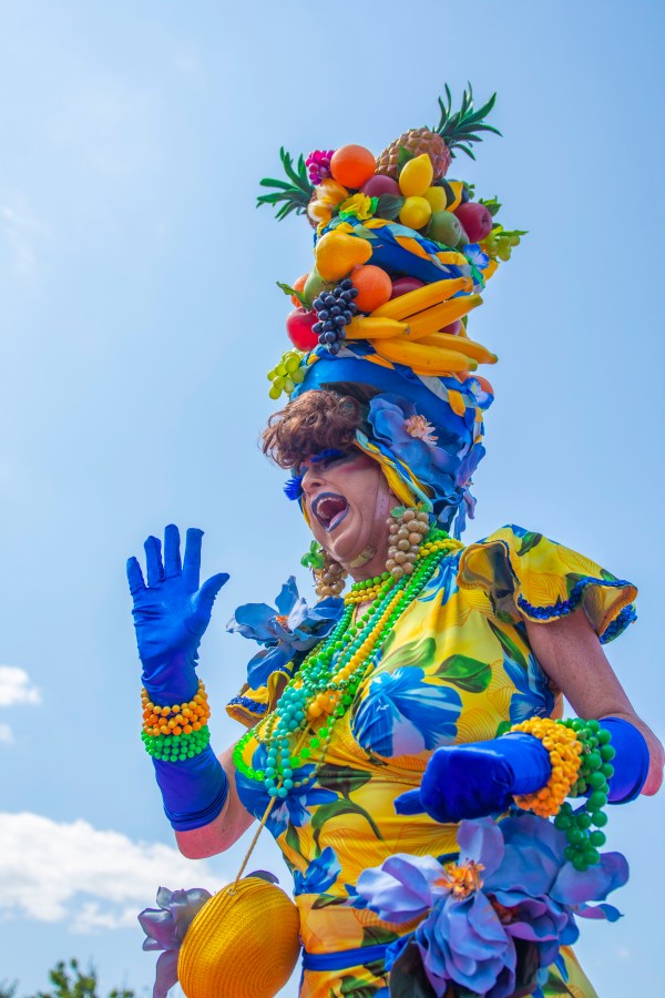 a drag queen in a fruit outfit