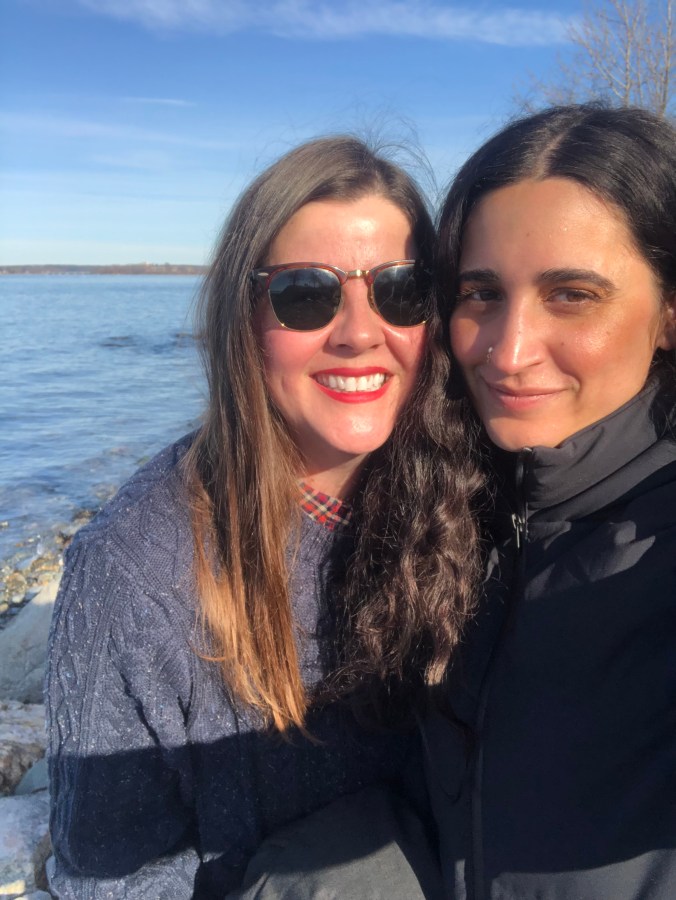 Kristen and Kayla in front of a body of water