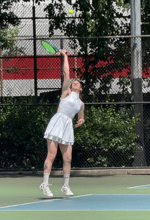 Cammie Woodman playing tennis