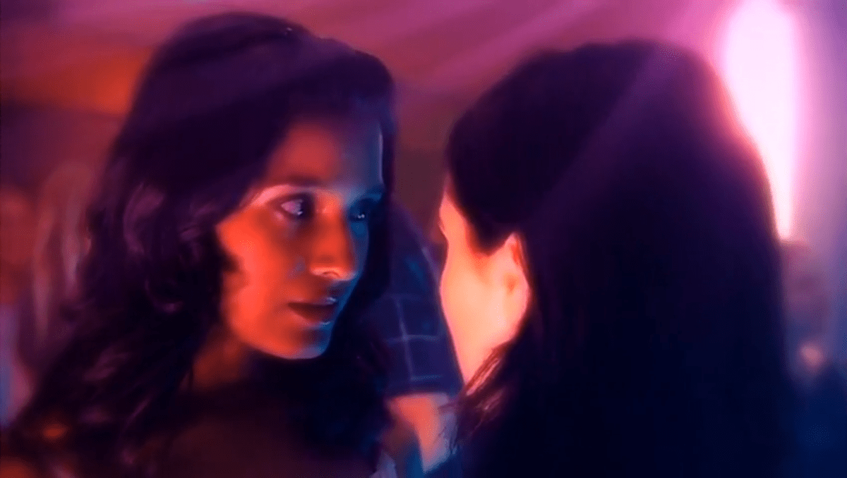 The best lesbian night club scenes: Shelley Conn and Laura Fraser make eye contact with glowy overexposed colors in Nina's Heavenly Delights