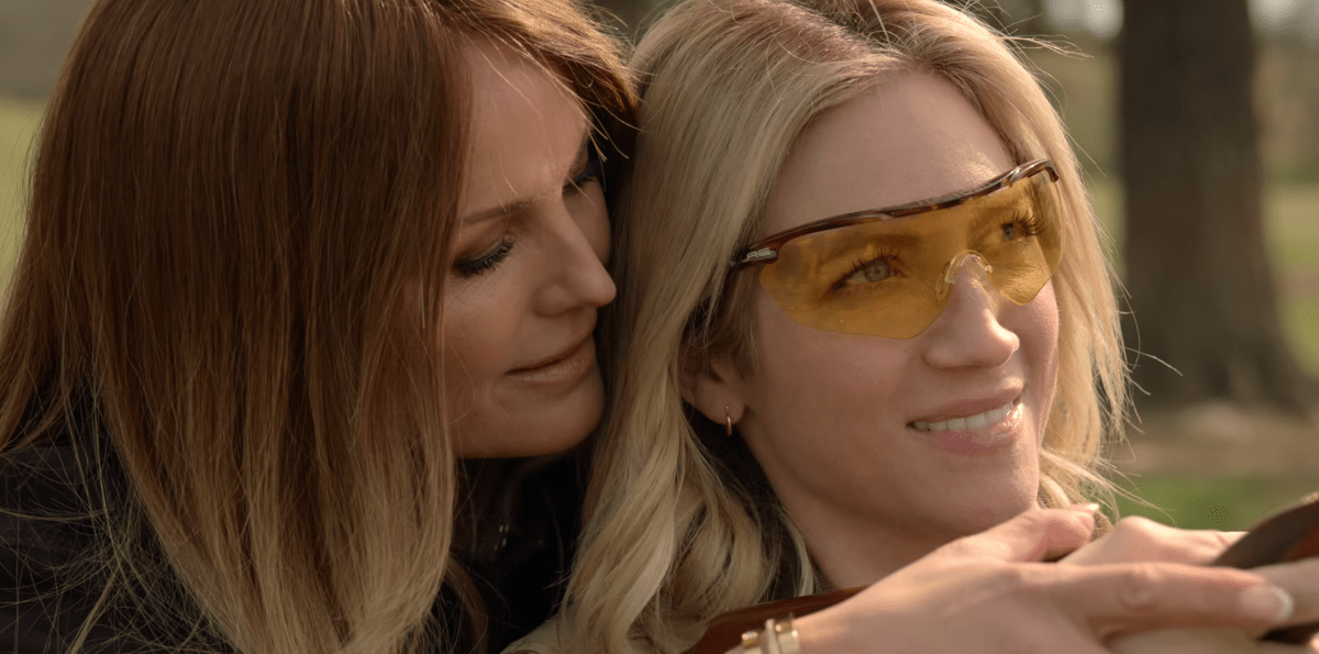 Margo and Sophie in The Hunting Wives with a gun