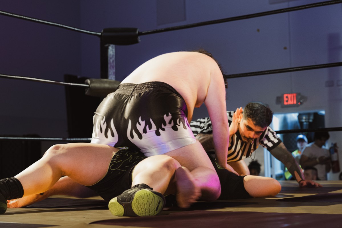 two competitors at Tboy wrestling in a pin