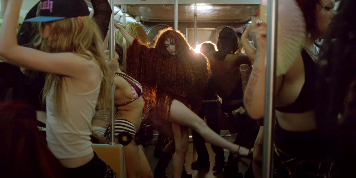 Chappell Roan on a subway car in the music video for "The Subway"