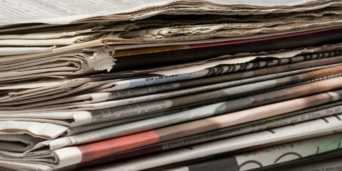 a stack of newspapers