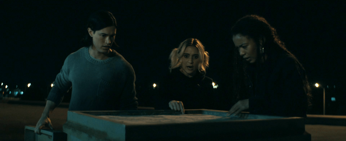 Gen V 205: jordan, emma, and marie on the roof of elmira looking at the bricked up vent