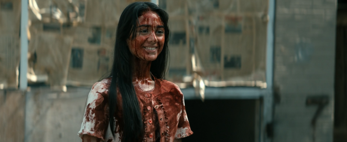 Gen V 206-9 zoe covered in blood and beaming
