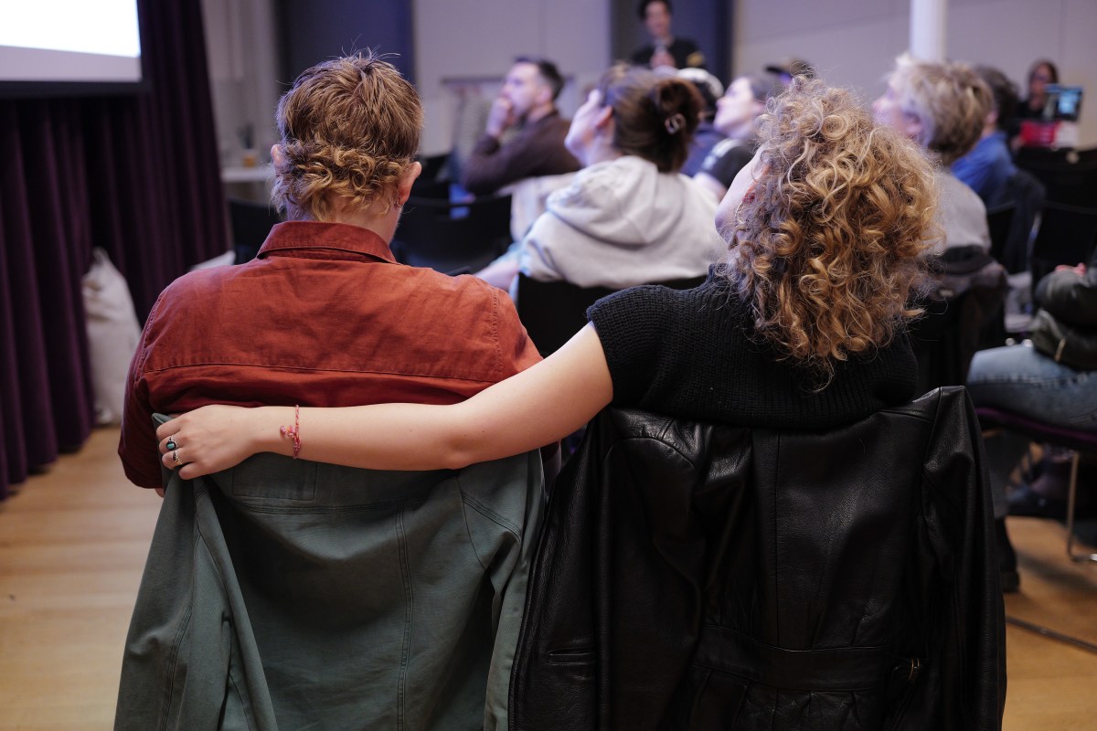 two attendees at the Lesbian Lives conference 2025