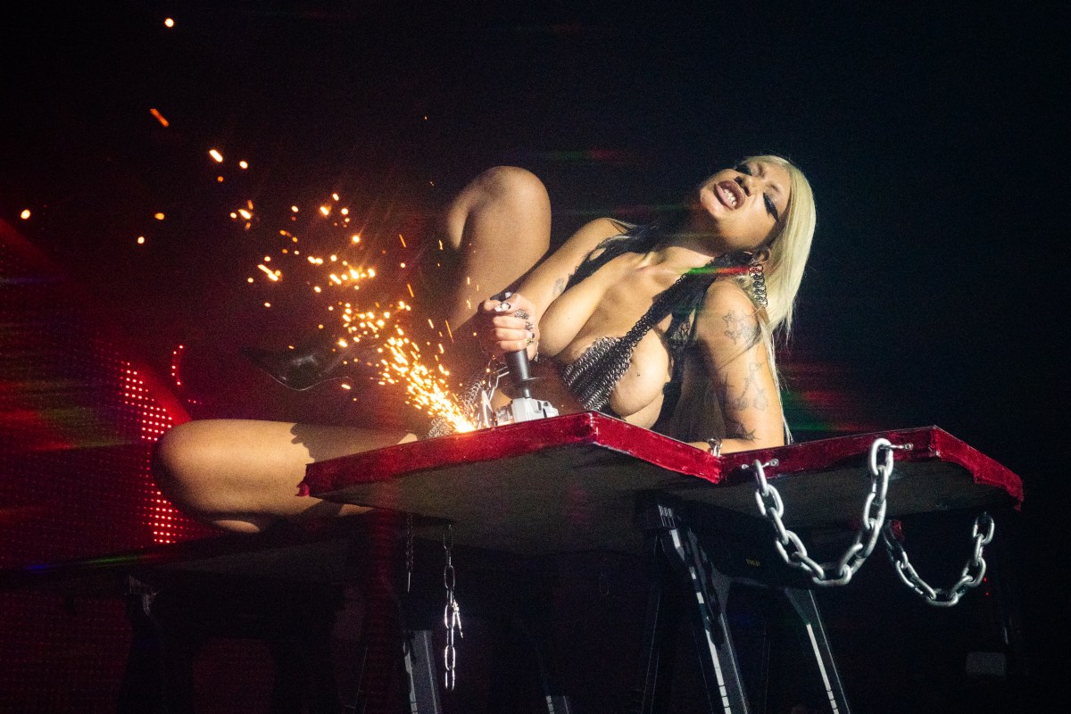 a performer on a cross