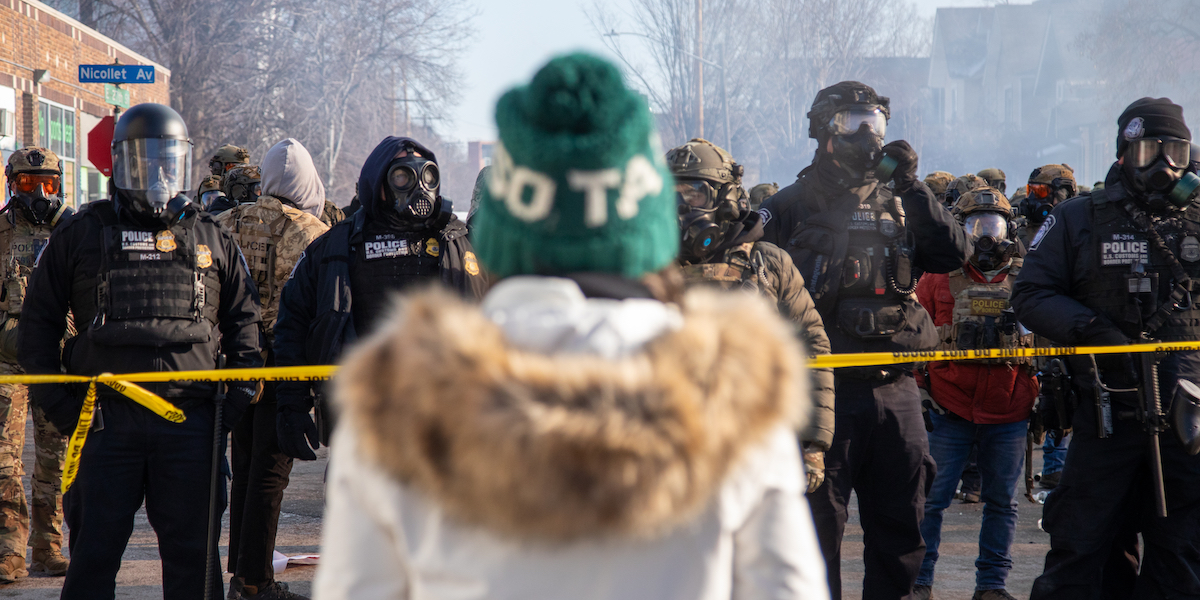 MINNEAPOLIS, UNITED STATES - JANUARY 24: Protesters clash with law enforcement after a federal agent shot and killed a man on Jan. 24 â" the second federal-involved shooting in the city this month, deepening tensions over enforcement operations in Minneapolis, United States, on January 24, 2026. (Photo by Arthur Maiorella/Anadolu via Getty Images)