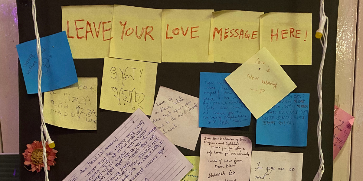 a board that says WRITE YOUR LOVE MESSAGE at the cafe Porshi