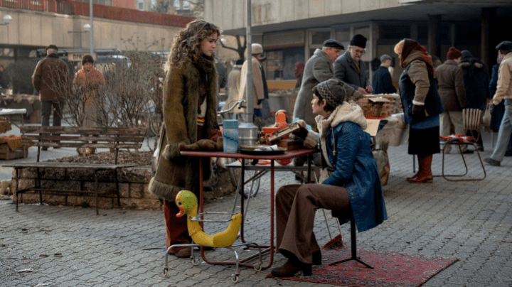 Ponies: Twila standing at Ivanna's market table