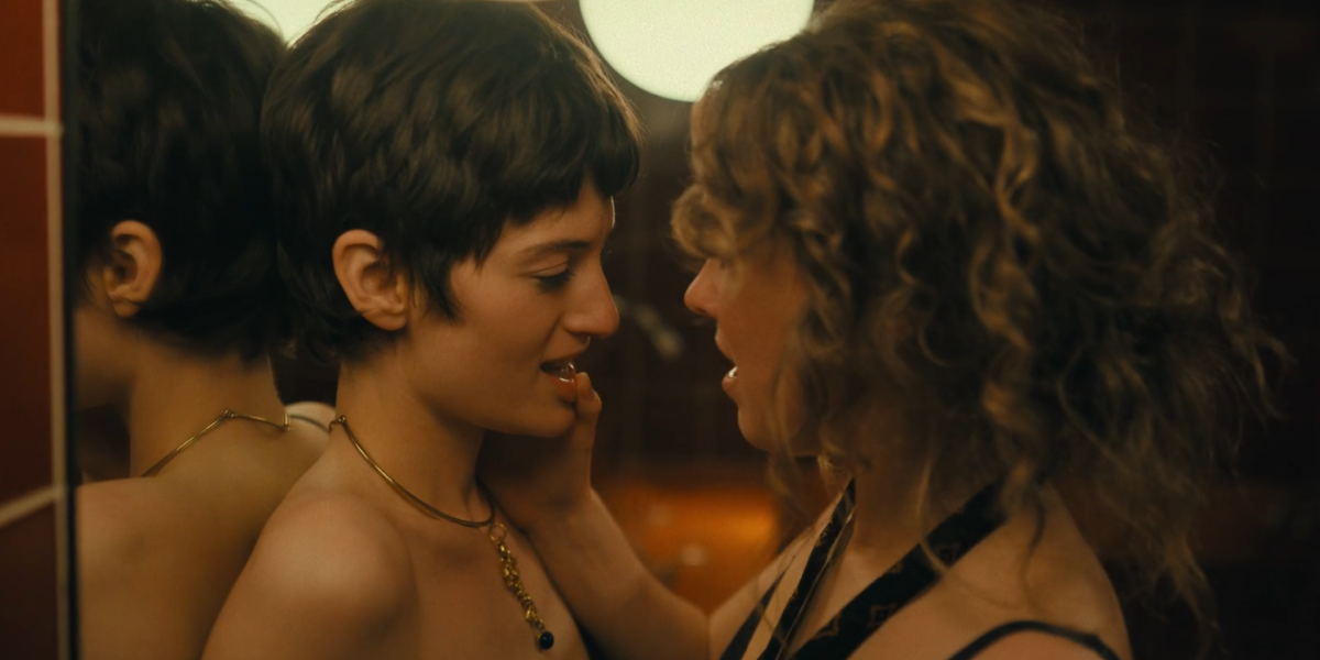 Ponies: Ivanna and Twila stare lustily at each other ,Twila's thumb on Ivanna's lip