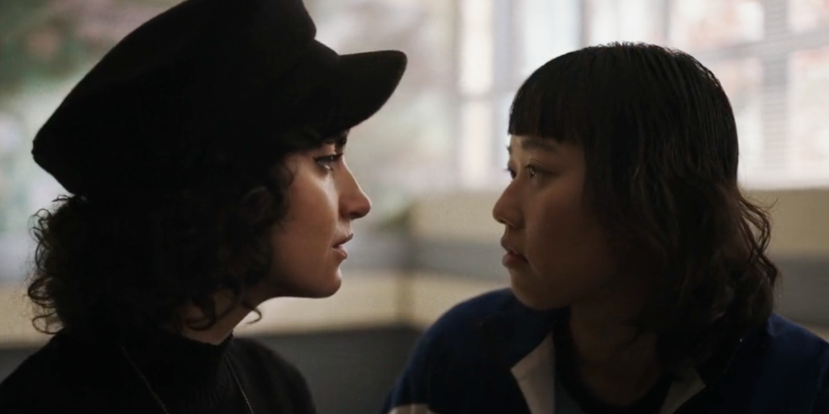 School Spirits: Rhonda leans into Quinn for a kiss