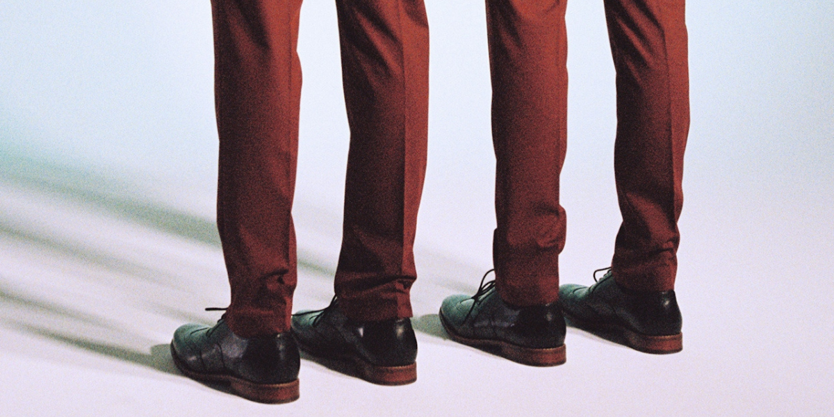 two pairs of legs in the same pants