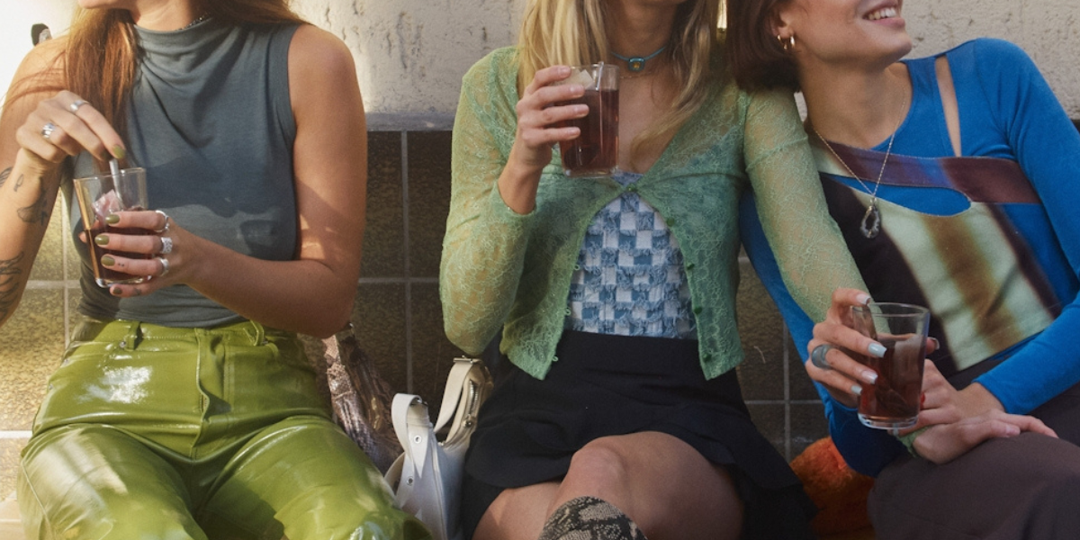three women on a bench