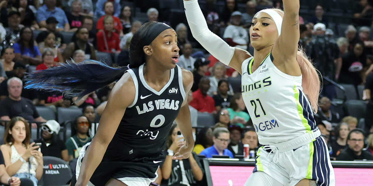 LAS VEGAS, NEVADA - JUNE 13: Jackie Young #0 of the Las Vegas Aces handles the ball against DiJonai Carrington #21 of the Dallas Wings in the first quarter of their game at Michelob ULTRA Arena on June 13, 2025 in Las Vegas, Nevada. The Aces defeated the Wings 88-84. NOTE TO USER: User expressly acknowledges and agrees that, by downloading and or using this photograph, User is consenting to the terms and conditions of the Getty Images License Agreement. (Photo by Ethan Miller/Getty Images)