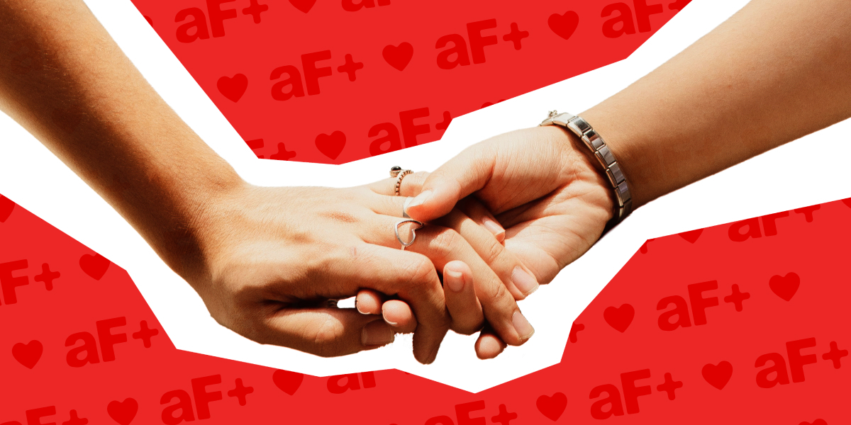 two people holding hands