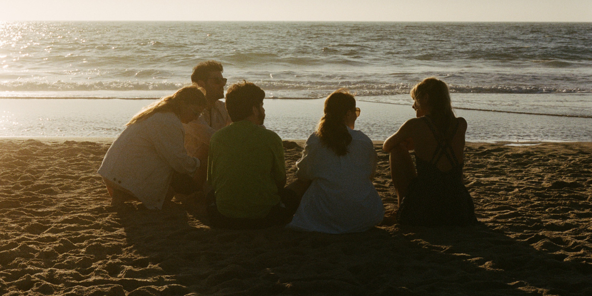 a group of friends on the beach